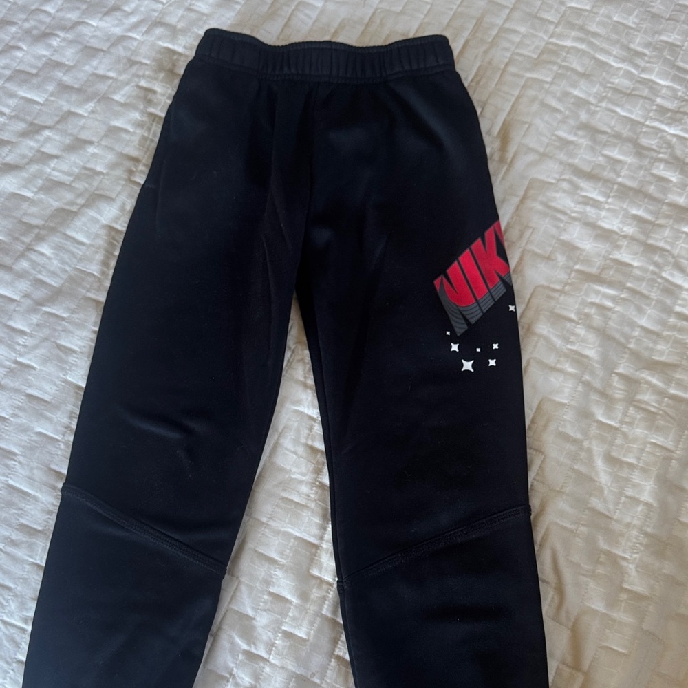 Nike Kids Black Sweatpants with Red Logo